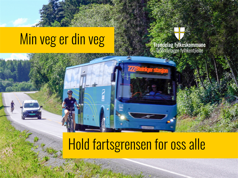 Min veg er din veg_Ny_1.png På bildet ser vi to syklister, en personbil og en buss på en fylkesveg mot Steinkjer stasjon. Bussen passerer syklisten som befinner seg fremst i bildet. Øverst står slagordet "Min veg er din veg", og nederst står "Hold fartsgrensen – for oss alle".