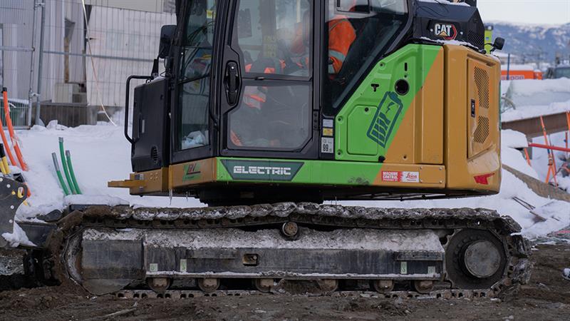 Elektrisk gravemaskin. Bilde